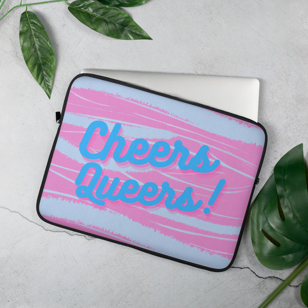 Laptop sleeve angled on a tabletop, with pink and light-blue stripes and blue “Cheers Queers!” text