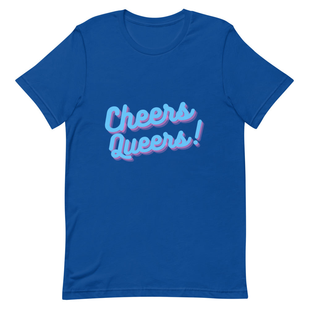 cheers queers t shirt: Cheers Queers! T-shirt on a short-haired person, arms crossed in a cozy home bar lit by string lights