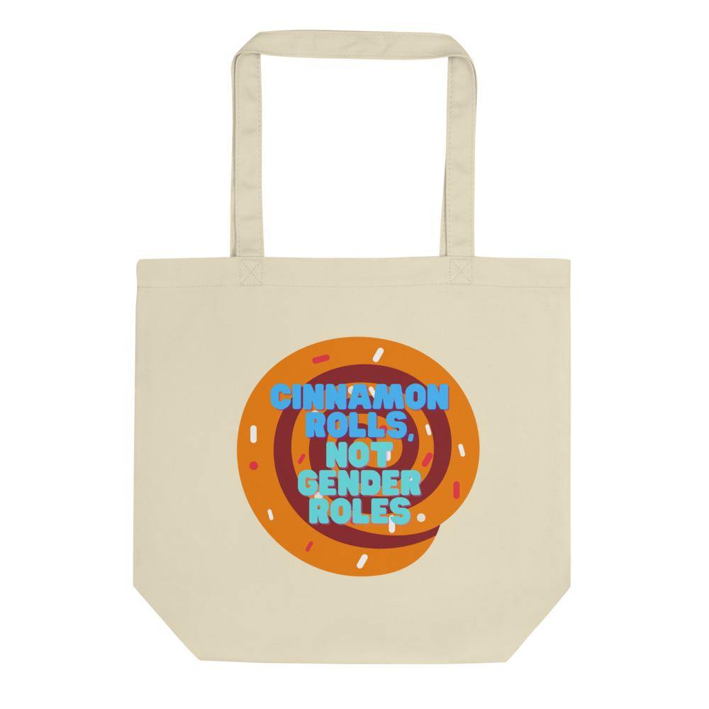 Cream eco tote bag with a cinnamon roll graphic and “CINNAMON ROLLS NOT GENDER ROLES” slogan