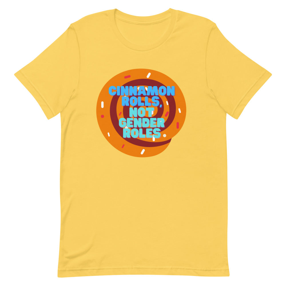 Yellow T-shirt with a cinnamon roll graphic and “CINNAMON ROLLS, NOT GENDER ROLES” slogan