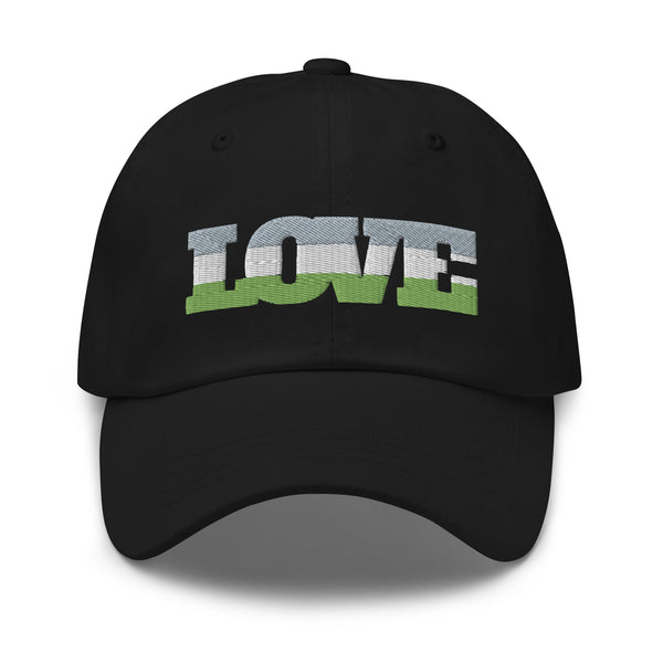 Front view of a black cap embroidered with the word “LOVE” in genderqueer flag colors