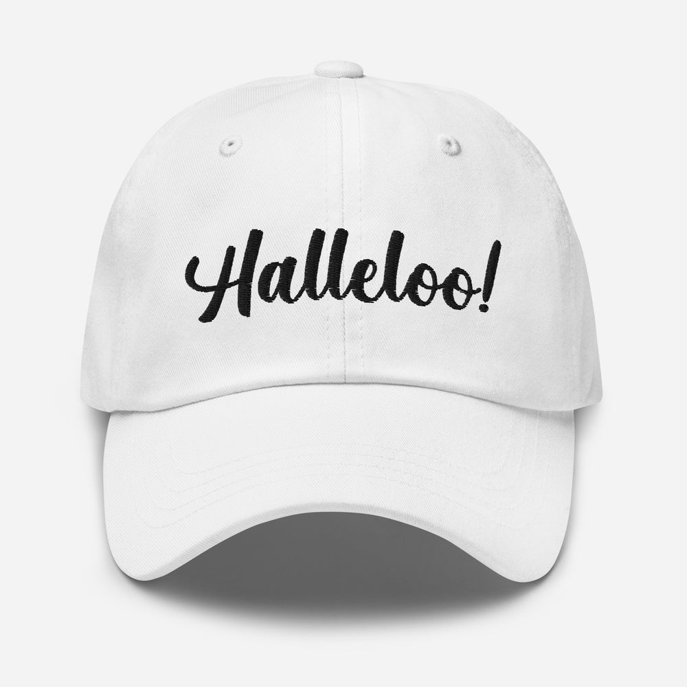 Front view of a white baseball cap embroidered with “Halleloo!” in black script