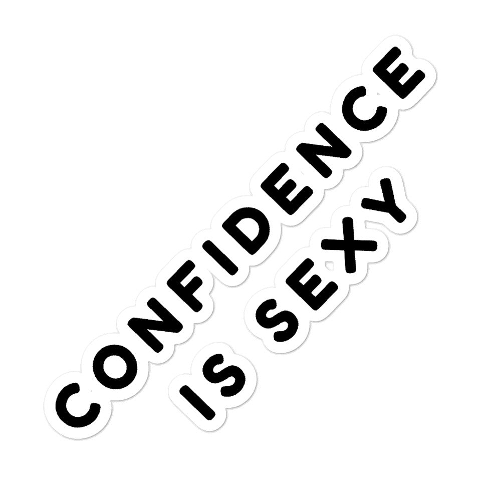 White sticker with bold black lettering reading “CONFIDENCE IS SEXY” arranged diagonally