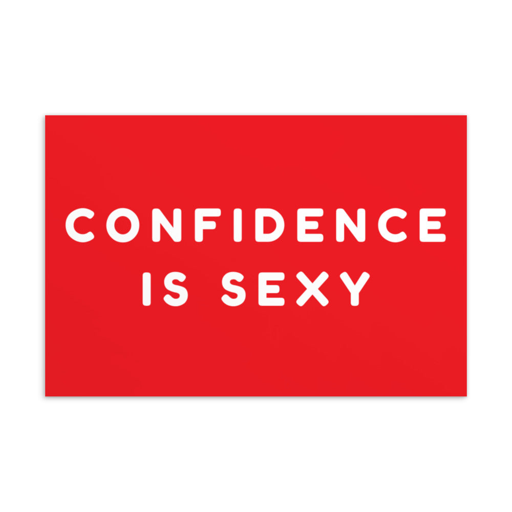Red postcard with bold white text reading “CONFIDENCE IS SEXY”
