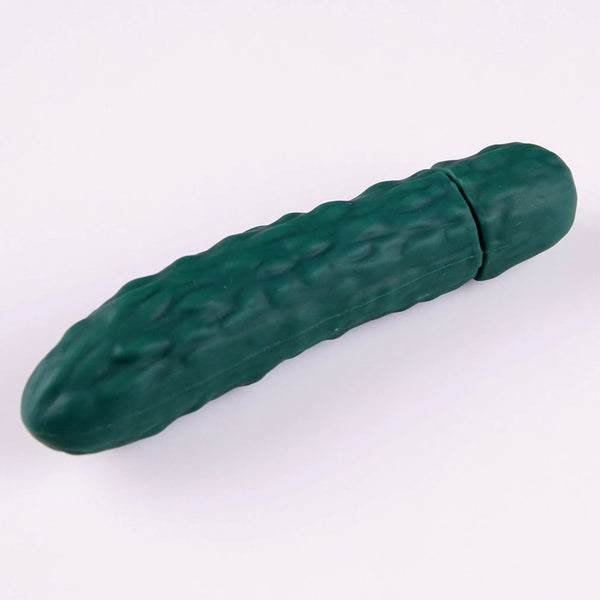Dark green cucumber-shaped vibrator shown diagonally on a pale background
