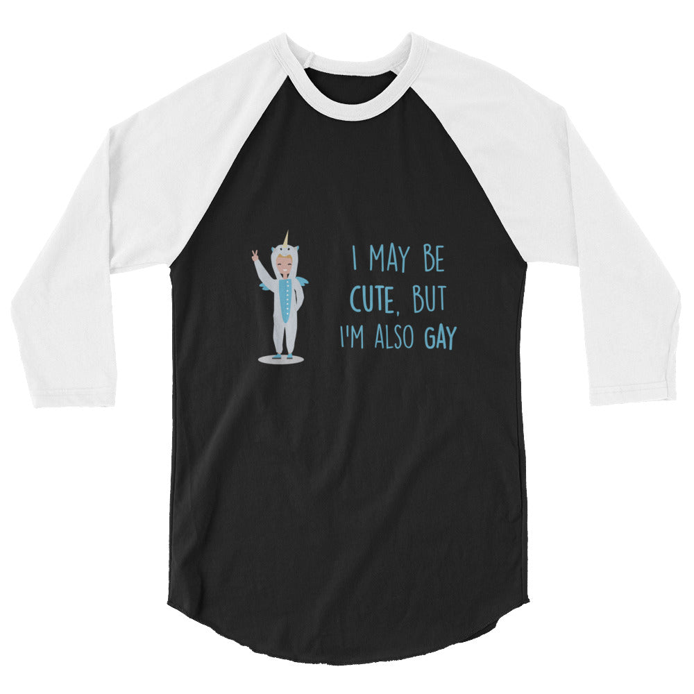 Black-and-white raglan shirt with cartoon figure and “I MAY BE CUTE, BUT I'M ALSO GAY” text