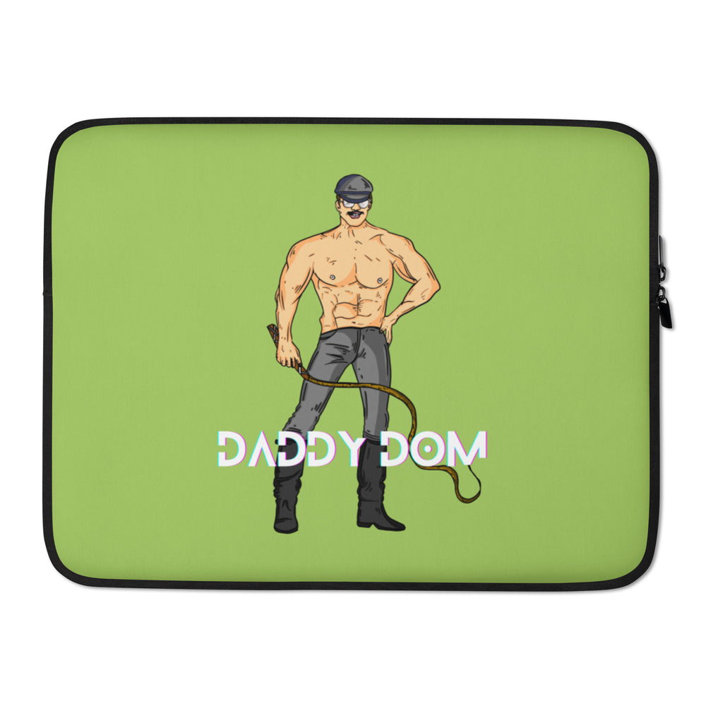 Front view of a green laptop sleeve with a shirtless cap-wearing man and the words “DADDY DOM”