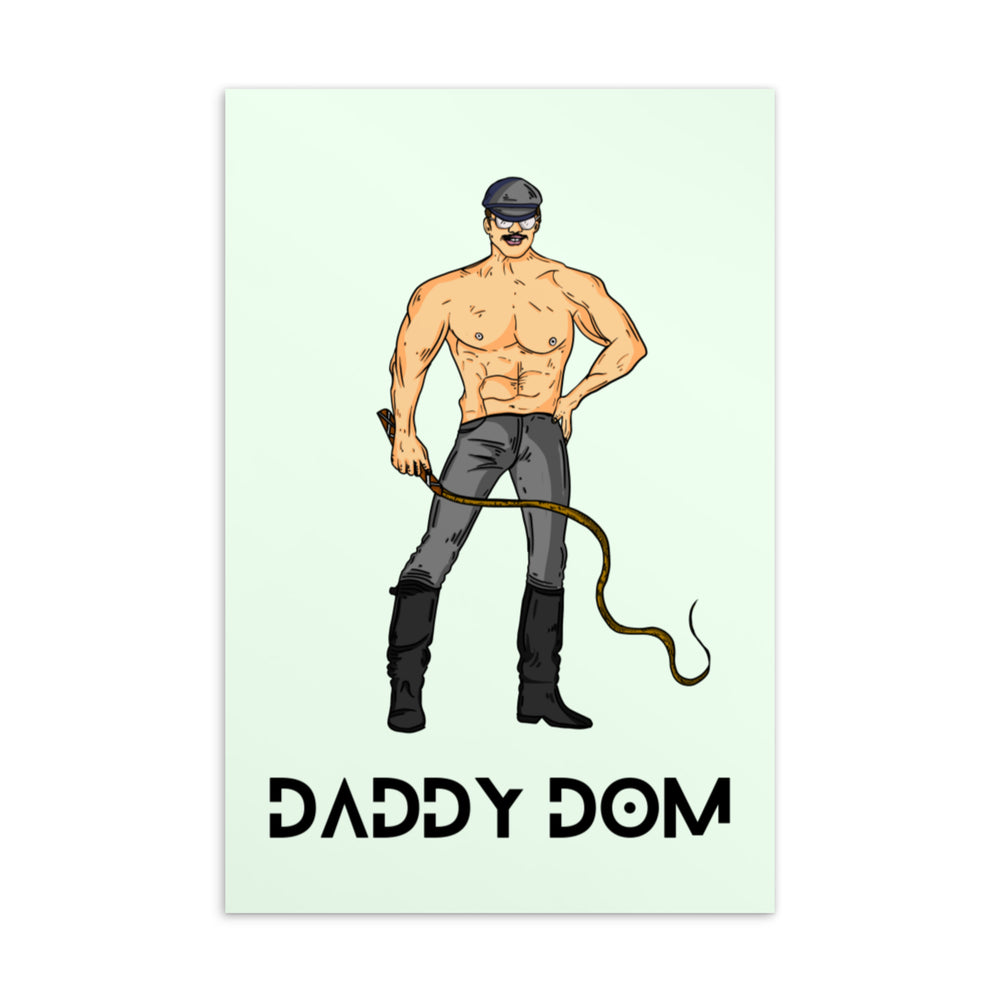 Postcard showing a shirtless mustached man in a cap holding a riding crop and whip above “DADDY DOM”