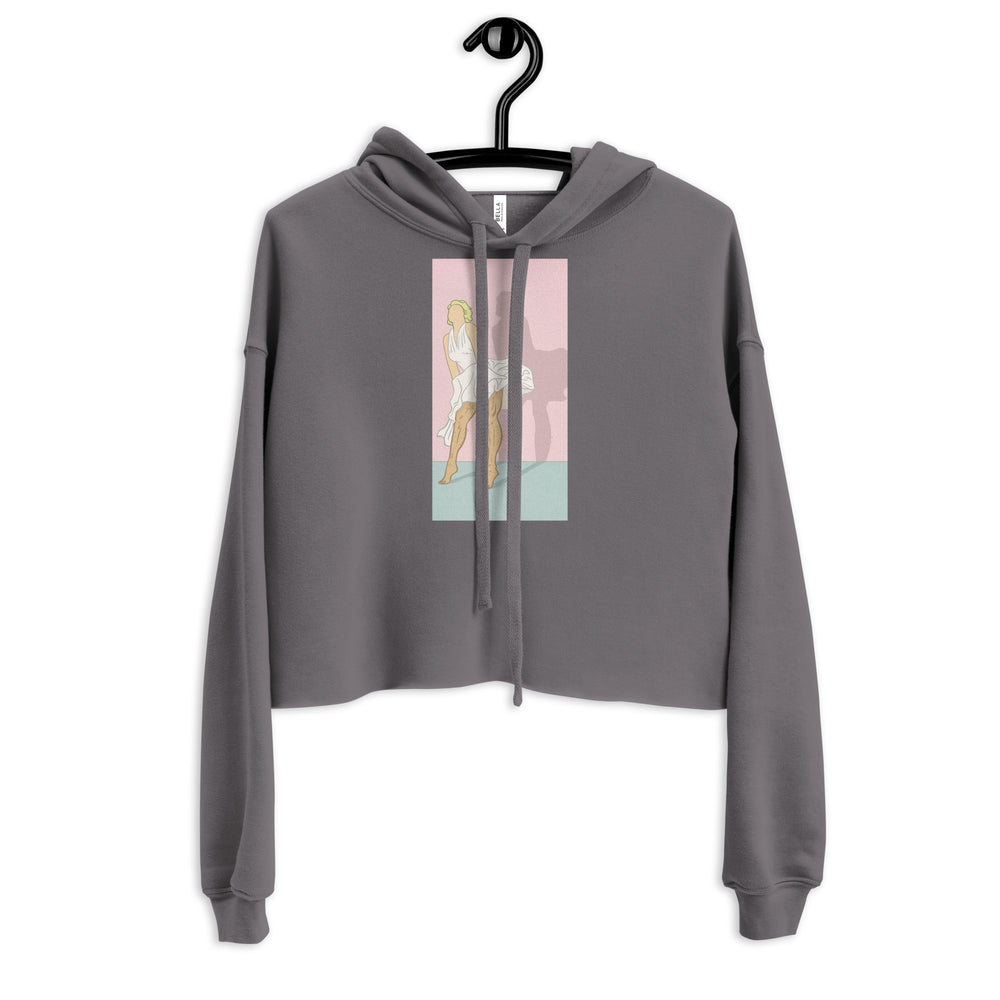 Front view of a charcoal cropped hoodie with drawstrings and a pink Marilyn Monroe-style graphic