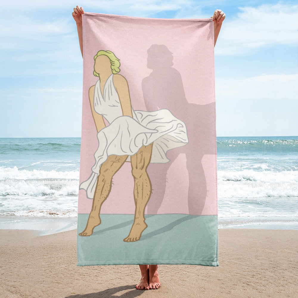 Pink beach towel featuring a vintage-style illustration of a person in a billowing white dress