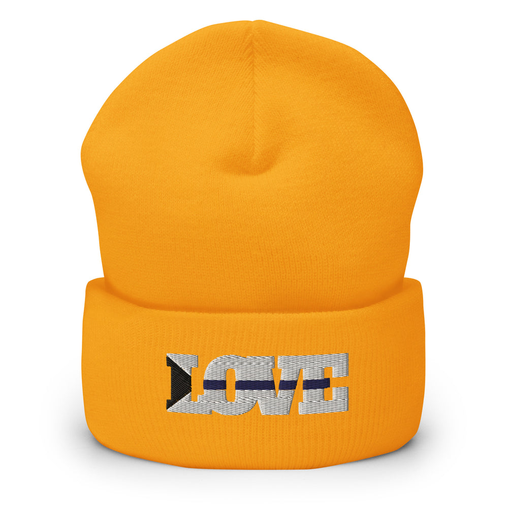 Orange cuffed beanie with embroidered silver “LOVE” lettering and a dark stripe