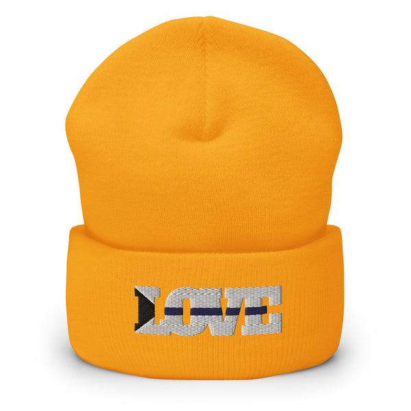 Orange cuffed beanie with embroidered silver “LOVE” lettering and a dark stripe