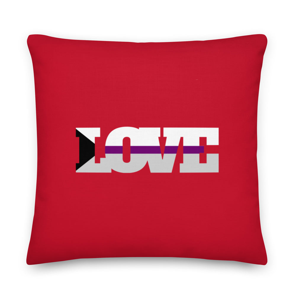 Front-facing red pillow with a black, white, and purple LOVE graphic