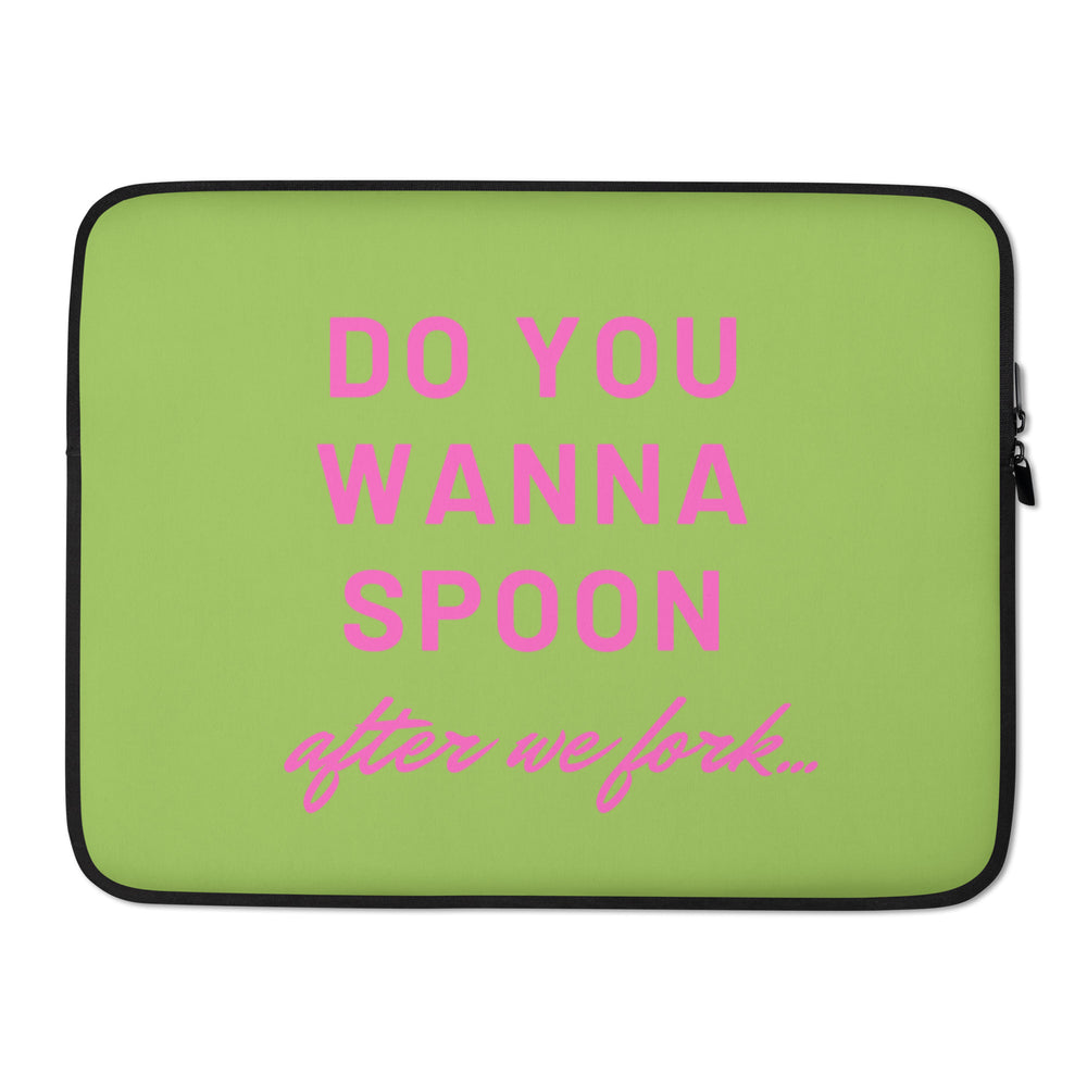 Green laptop sleeve with pink lettering: “Do You Wanna Spoon after we fork...”