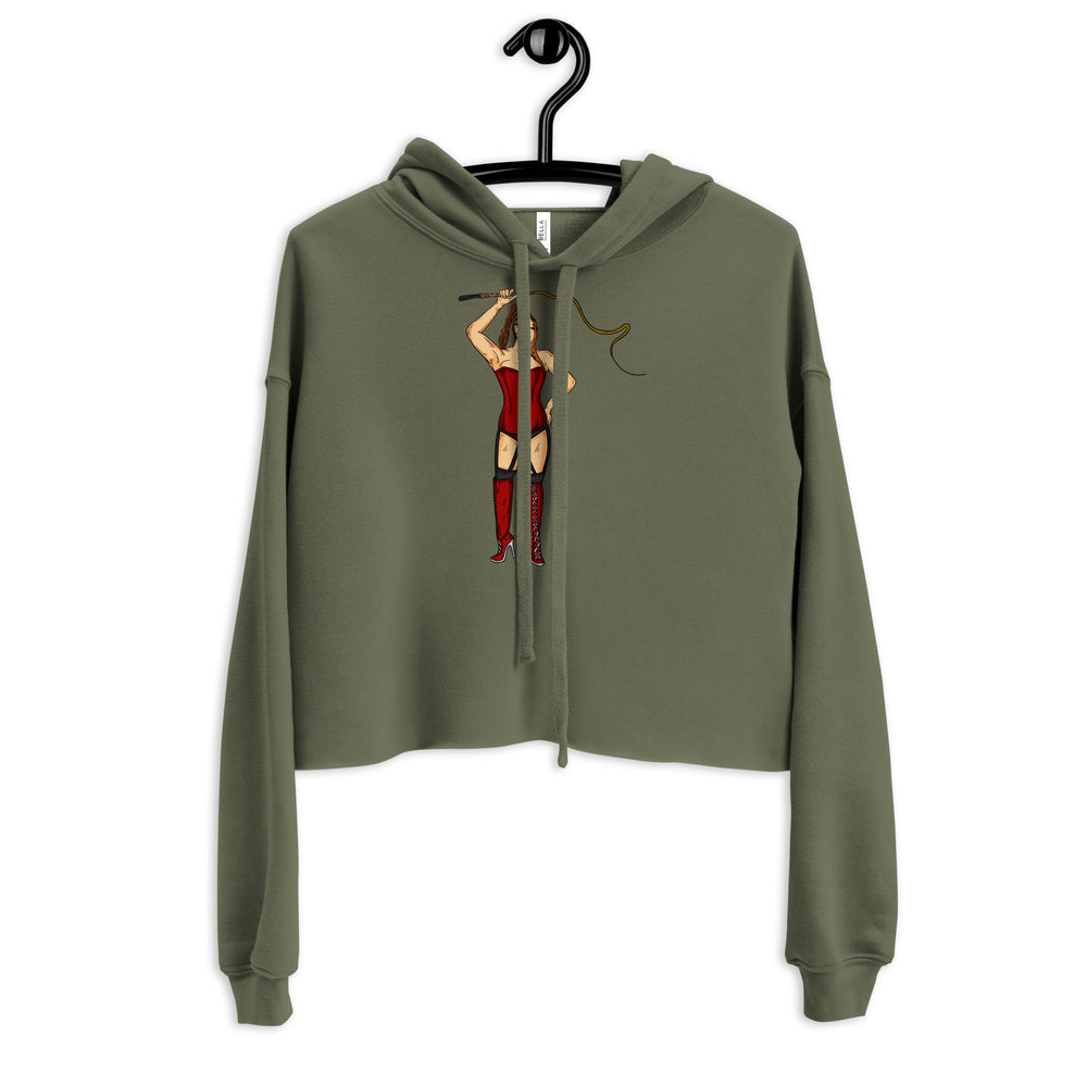 Front view of an olive-green cropped hoodie with a red corset-clad figure holding a whip