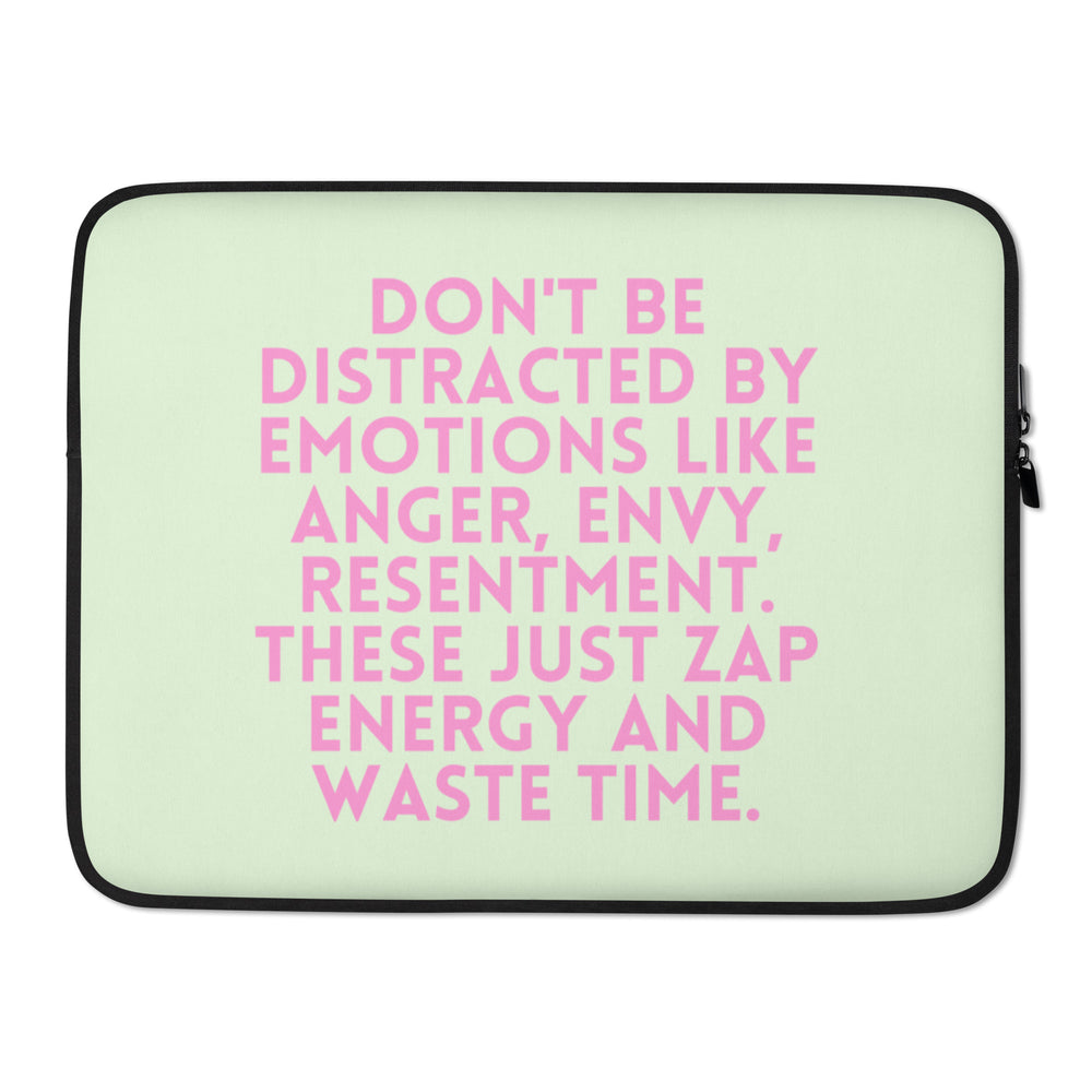 Front view of a pale green laptop sleeve with bold pink text and black trim