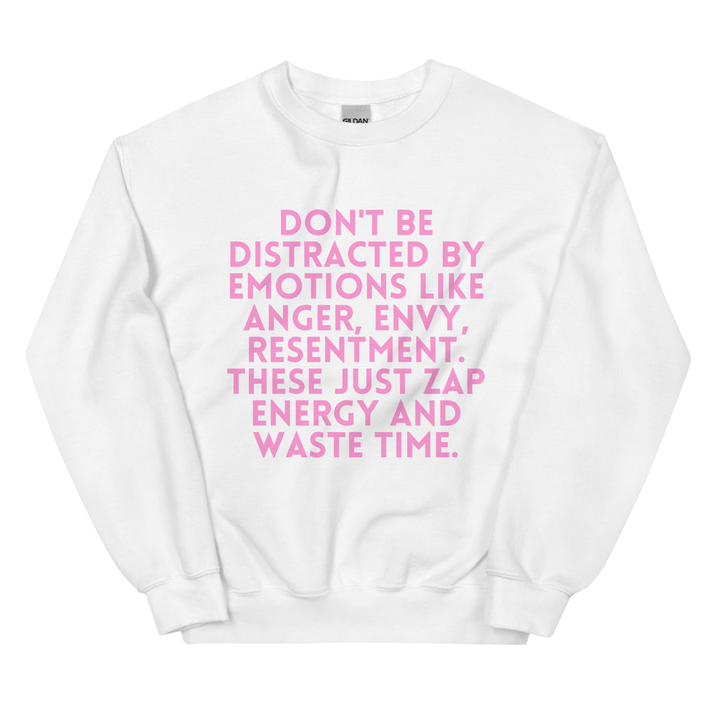 Front view of a white sweatshirt with large pink text about emotions and wasting time