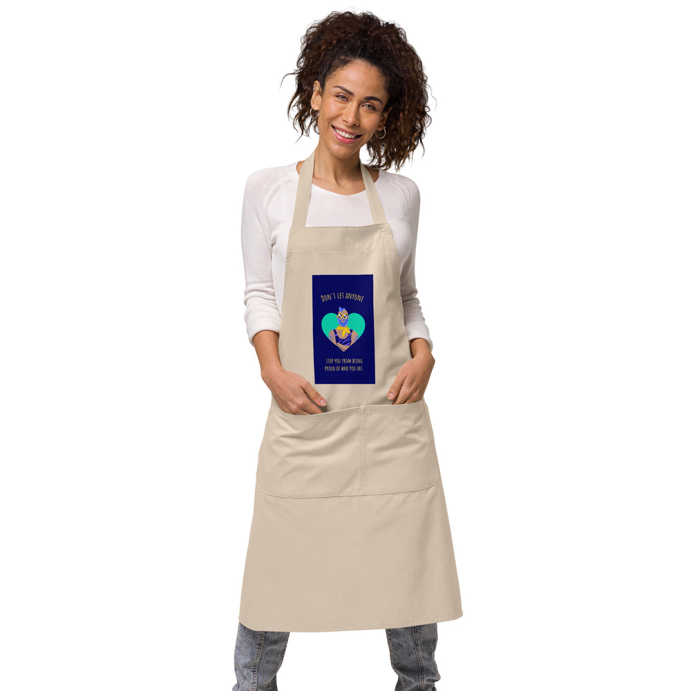 Beige organic cotton apron with “Don't Let Anyone Stop You From Being Proud” design