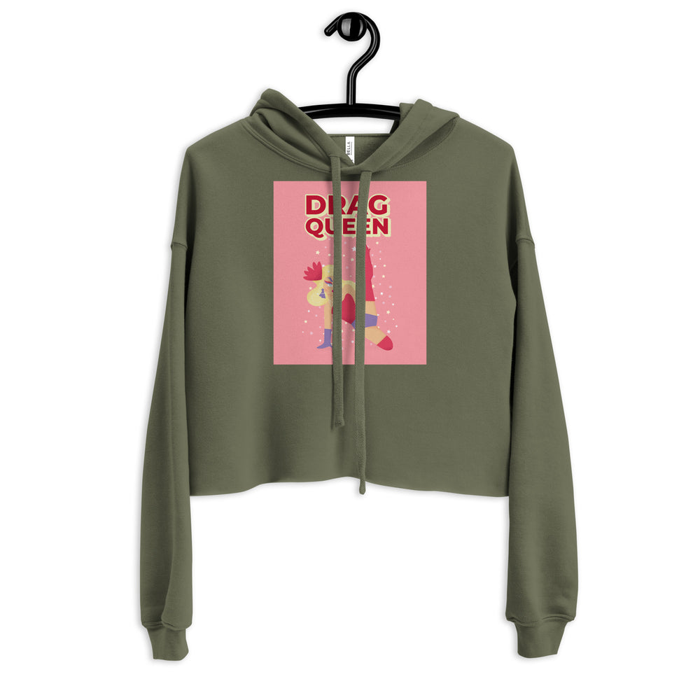 Front view of an olive-green cropped hoodie with a pink “DRAG QUEEN” graphic