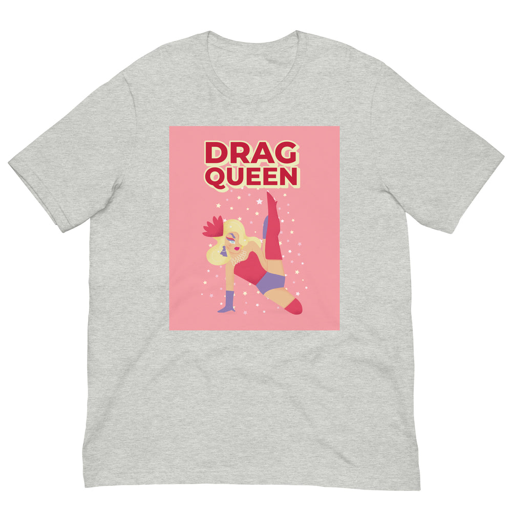 Drag Queen Unisex T-Shirt in a pink-lit dressing room, showing a cartoon drag queen and “DRAG QUEEN” text, worn by a blond queen.