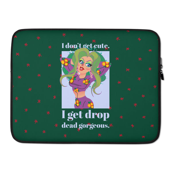 Front view of a dark green laptop sleeve with a drag queen illustration and “I don’t get cute. I get drop dead gorgeous.”