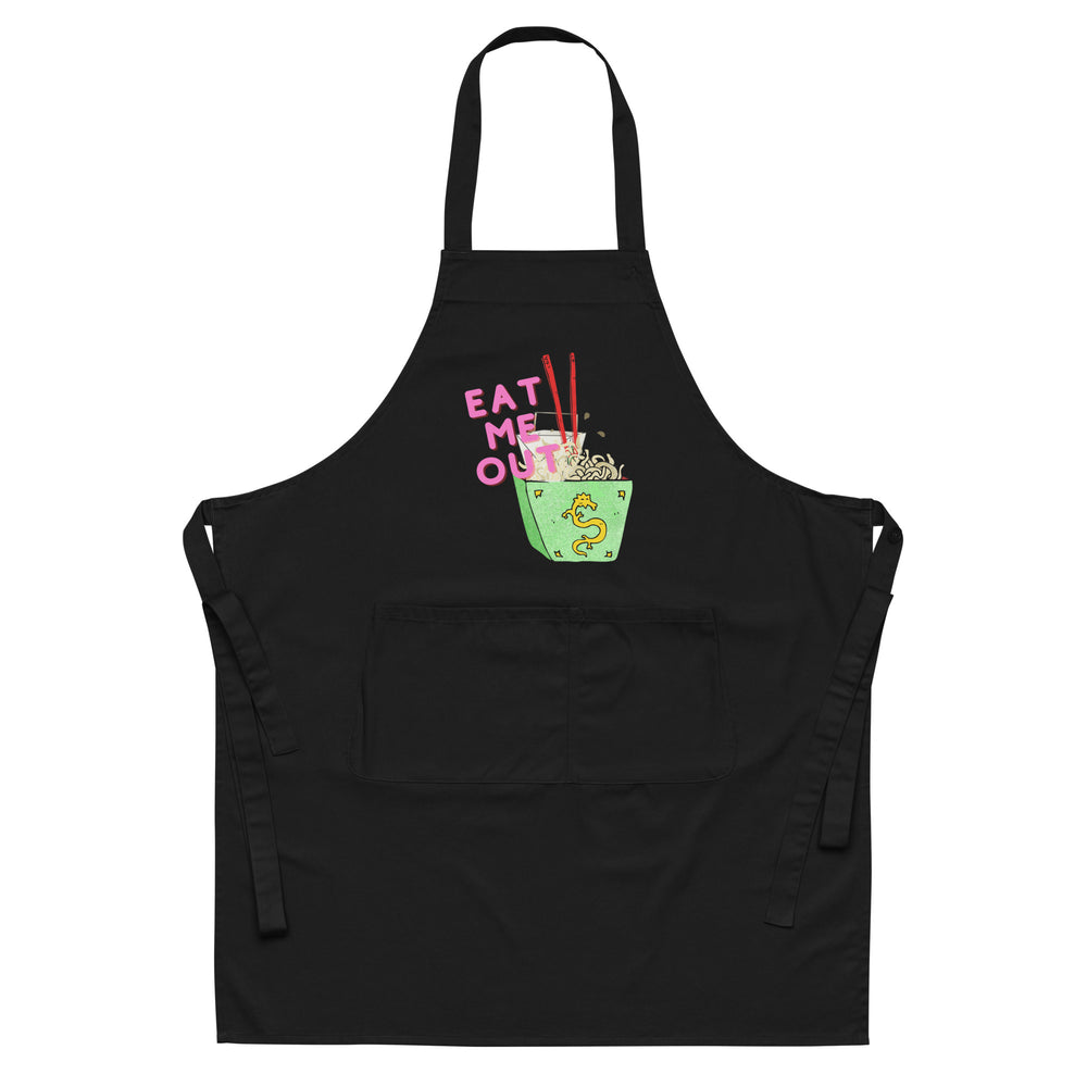 Front view of a black apron reading “EAT ME OUT” above a bowl of noodles