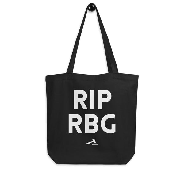 Black tote bag printed with “RIP RBG” and a white judge’s gavel graphic