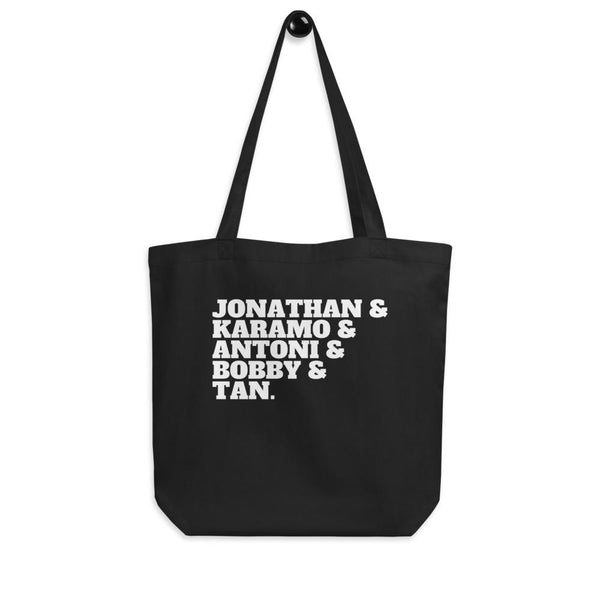 Black eco tote bag printed with “JONATHAN & KARAMO & ANTONI & BOBBY & TAN.”