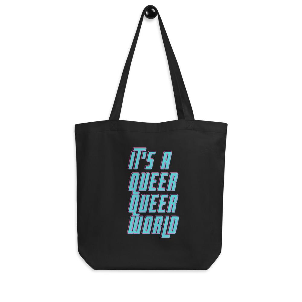 Black tote bag with colorful outlined text reading “IT’S A QUEER QUEER WORLD”