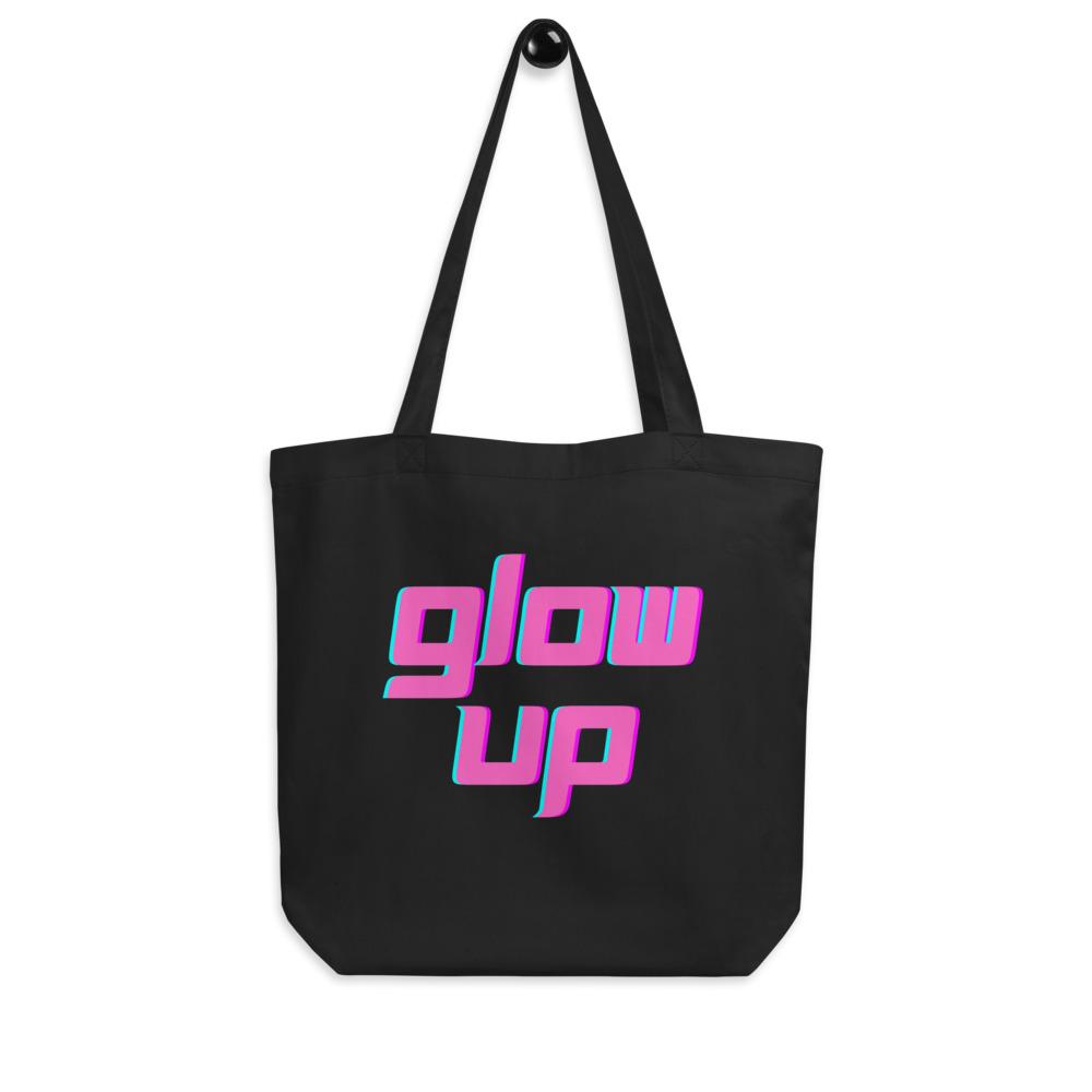 Black tote bag with pink and teal retro-style “glow up” lettering