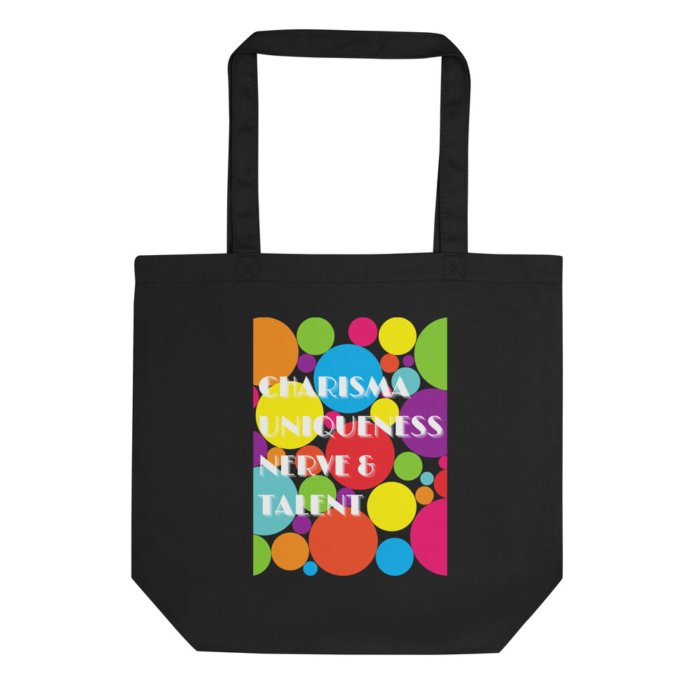 Front view of a black tote bag with colorful circles and “CHARISMA UNIQUENESS NERVE & TALENT” text