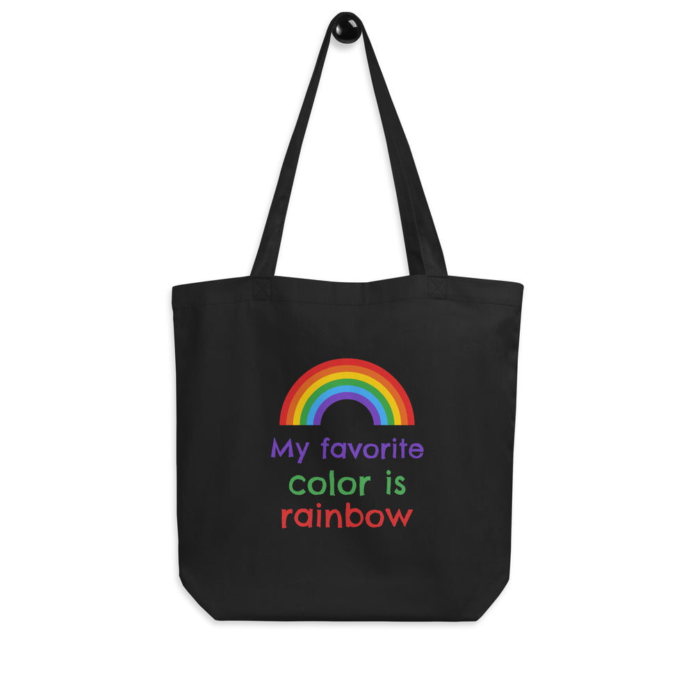 Front view of a black tote bag with a rainbow and the words “My favorite color is rainbow.”