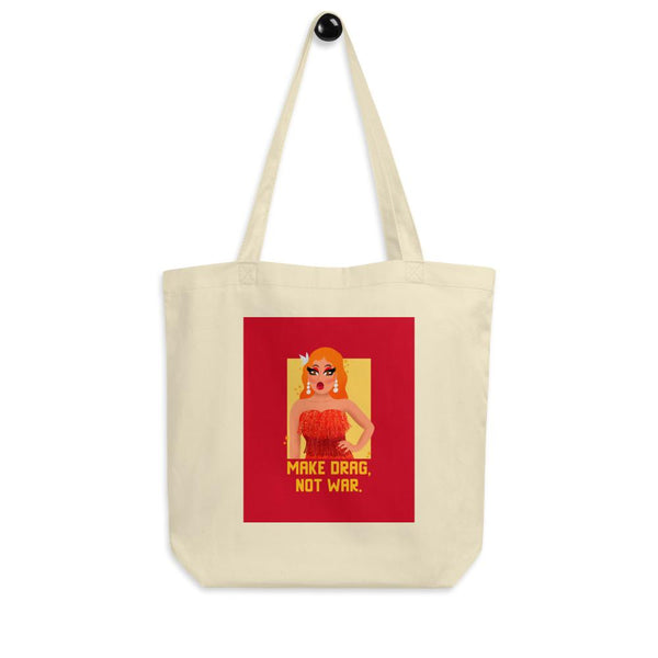 Cream canvas tote bag with drag queen graphic and “MAKE DRAG, NOT WAR.” slogan