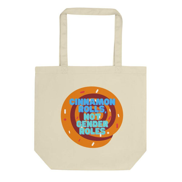 Cream eco tote bag with a cinnamon roll graphic and “CINNAMON ROLLS NOT GENDER ROLES” slogan