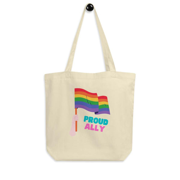 Cream canvas tote bag with rainbow flag graphic and “PROUD ALLY” lettering