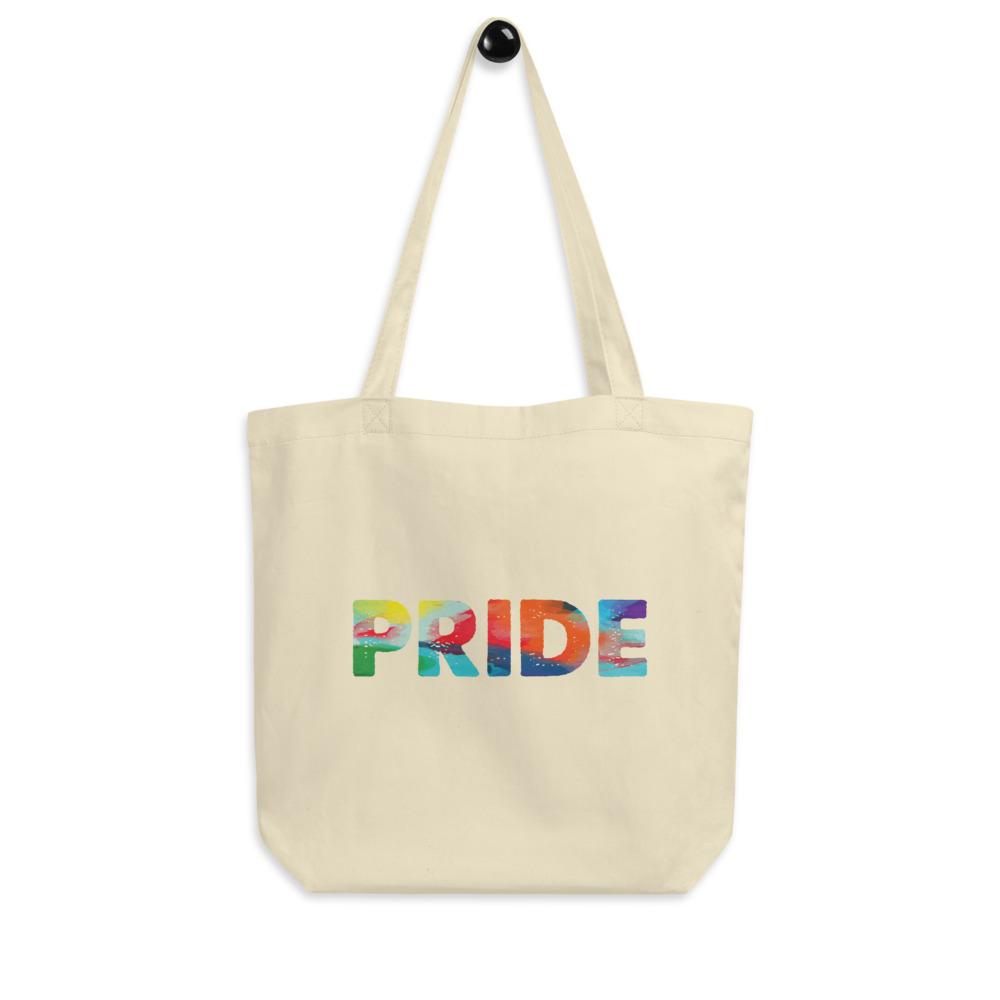 Cream Pride tote bag with colorful painted-style lettering and long shoulder straps