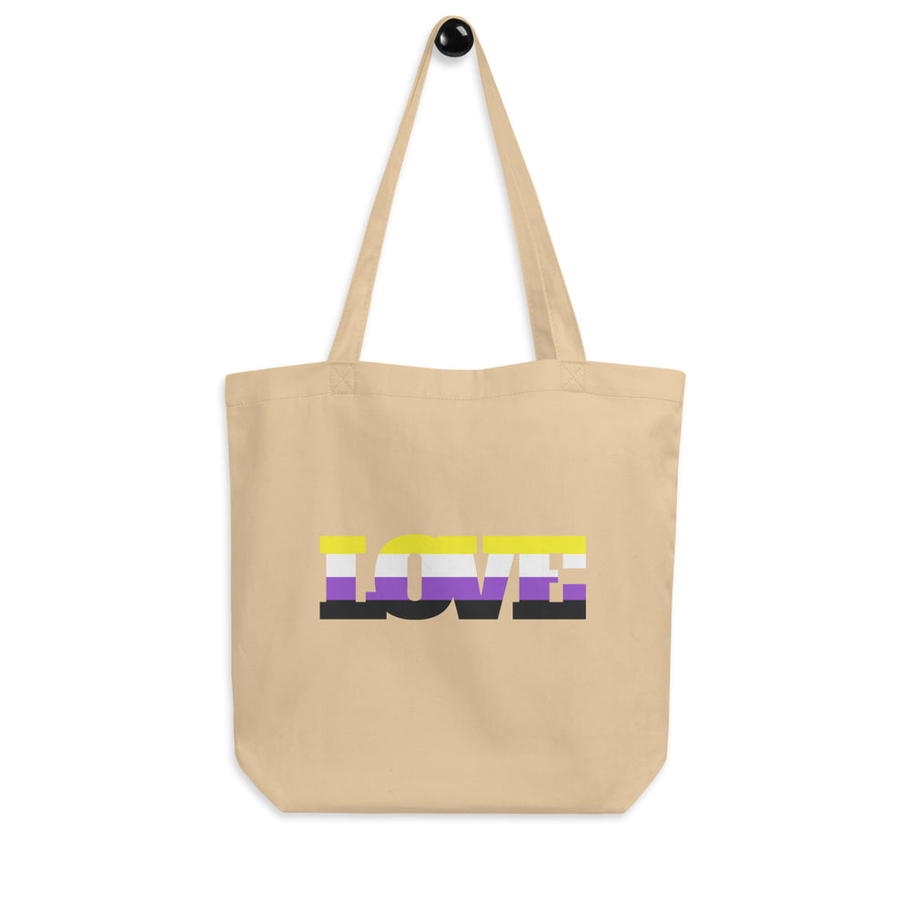 Front view of a natural canvas tote bag with long handles and a colorful “LOVE” design