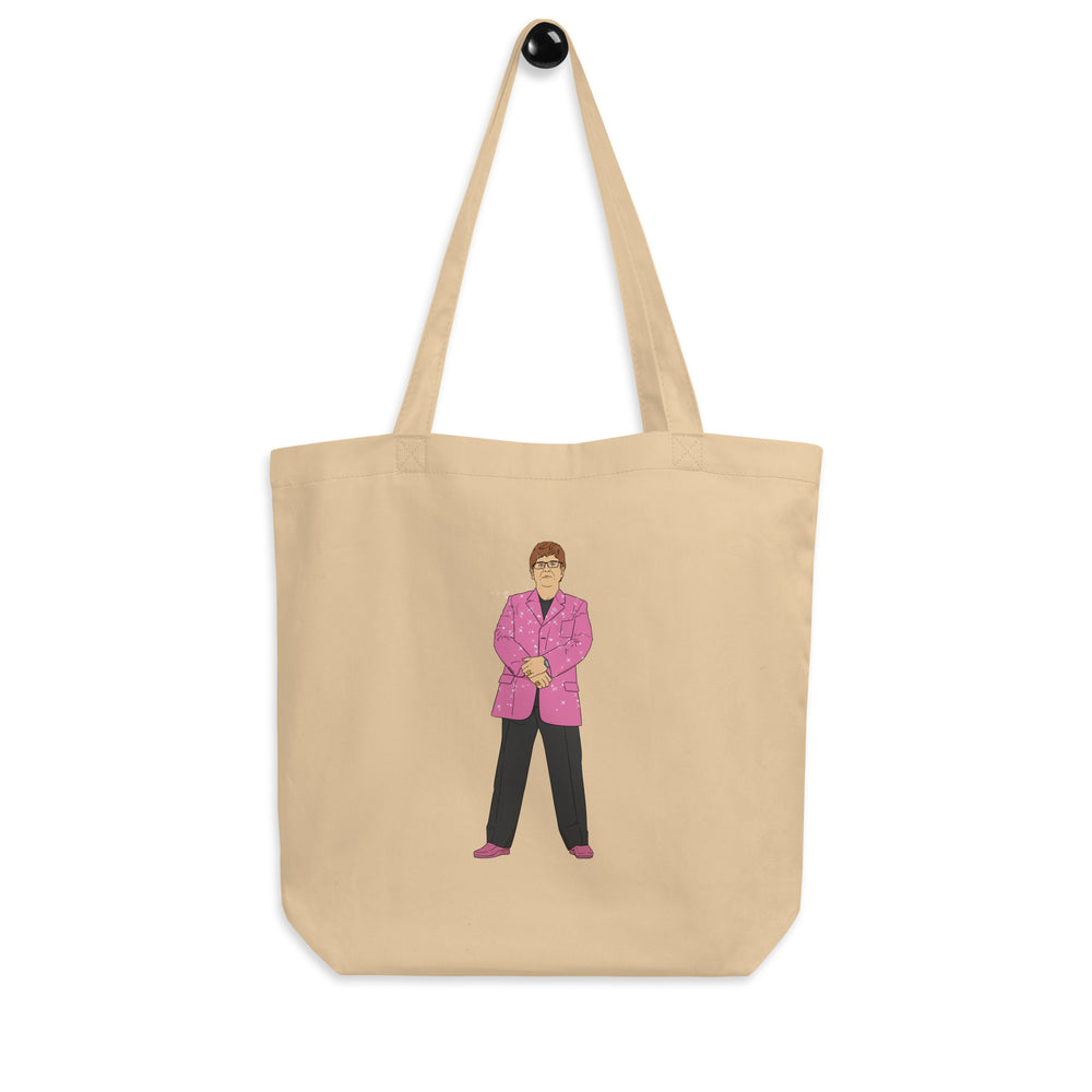 Front view of a natural canvas tote bag with an illustrated person in a pink suit