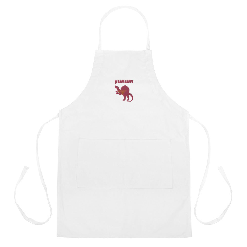 White Lesbosaurus apron with neck and waist ties, front pocket, and red dinosaur emblem