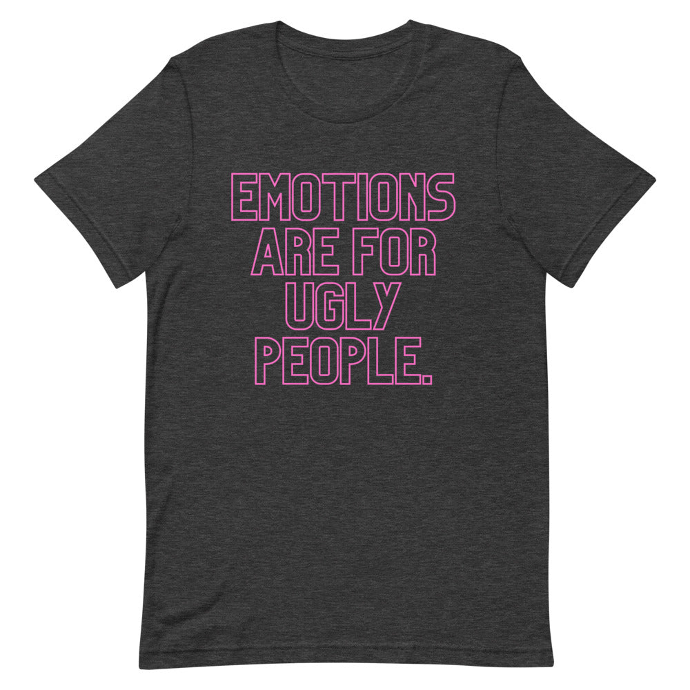 Front view of a dark gray T-shirt with pink outlined text reading “EMOTIONS ARE FOR UGLY PEOPLE.”