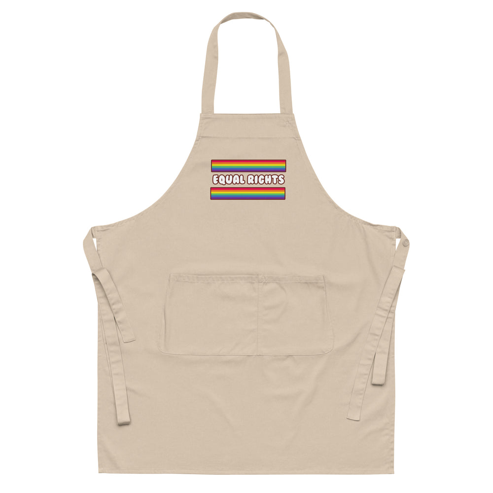 Front-facing beige apron with neck loop, waist ties, front pocket, rainbow stripes, and “EQUAL RIGHTS” text