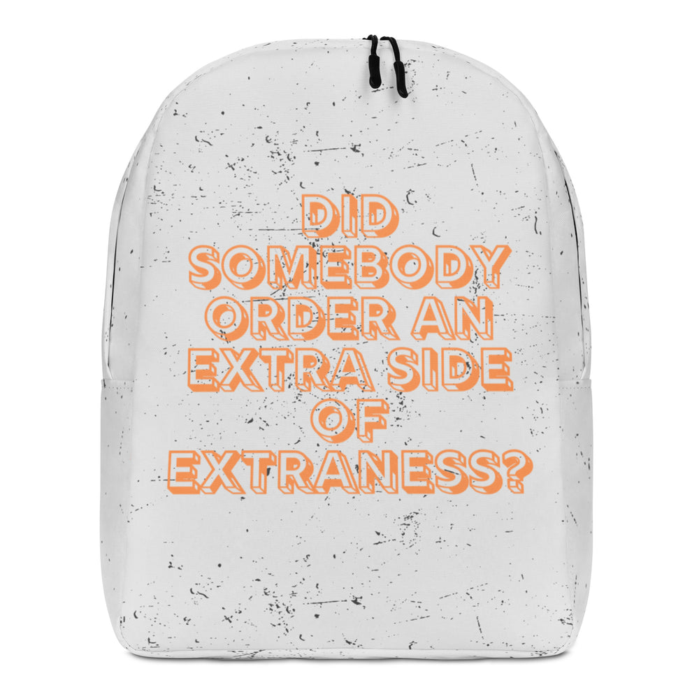 Front view of a white speckled backpack reading “DID SOMEBODY ORDER AN EXTRA SIDE OF EXTRANESS?”