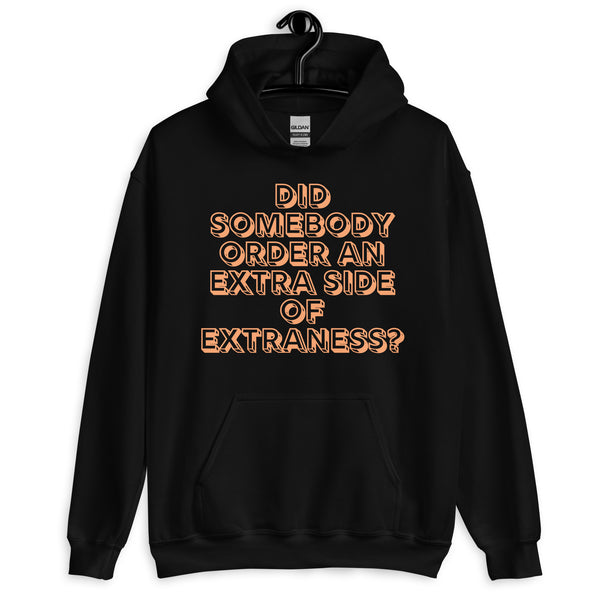 Front view of a black hoodie with peach text reading “Did somebody order an extra side of extraness?”