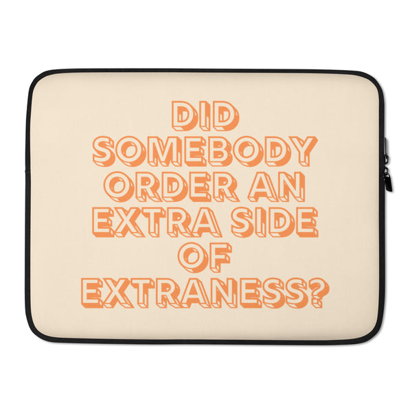 Beige laptop sleeve with black trim and orange text reading “DID SOMEBODY ORDER AN EXTRA SIDE OF EXTRANESS?”