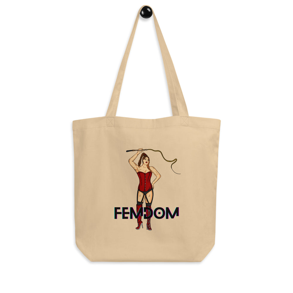 Natural canvas tote bag featuring a corset-clad woman with a riding crop and “FEMDOM” text