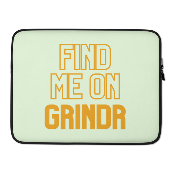 Front view of a pale green laptop sleeve reading “FIND ME ON GRINDR” in orange