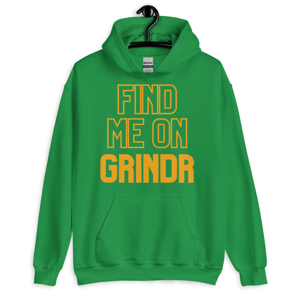 Front view of a green hoodie on a hanger reading “FIND ME ON GRINDR” in orange
