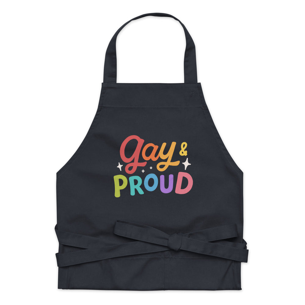 Front view of a black apron with a colorful “Gay & Proud” design and waist ties