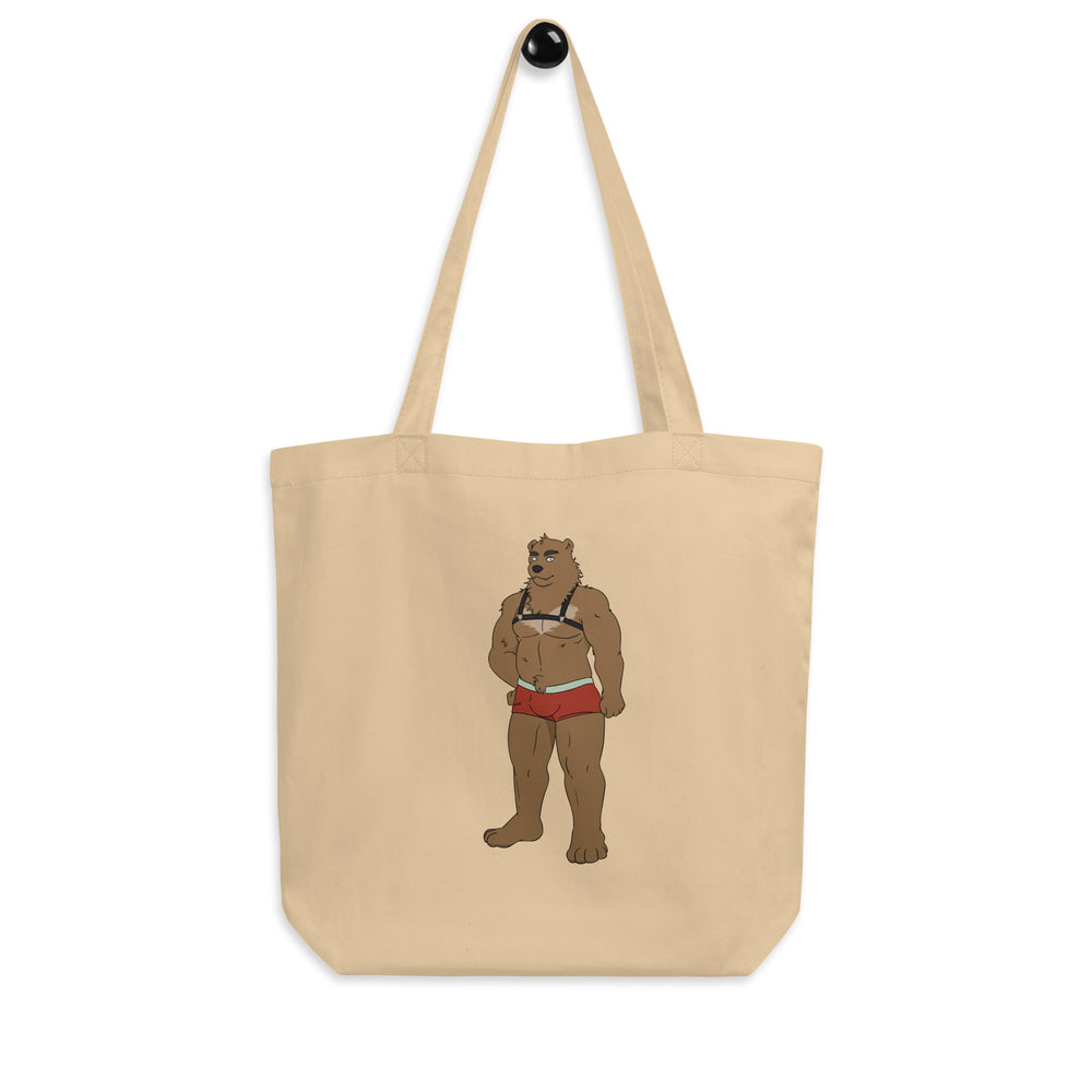 Natural canvas tote featuring a muscular bear in a harness and red briefs