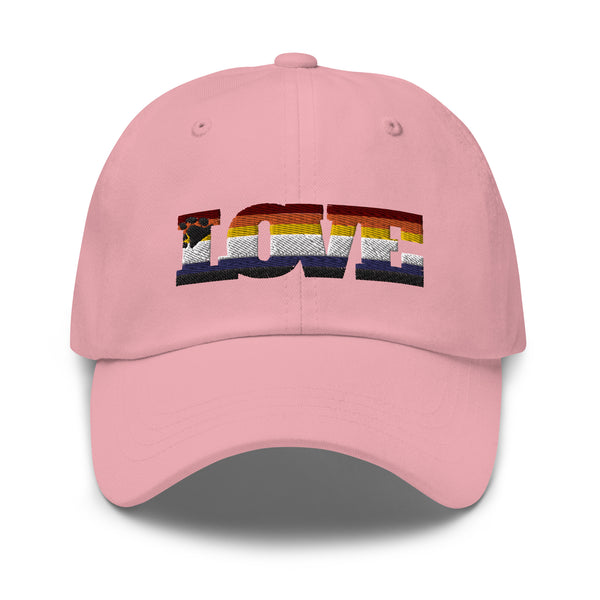 Front-facing pink baseball cap embroidered with a bear and rainbow stripes